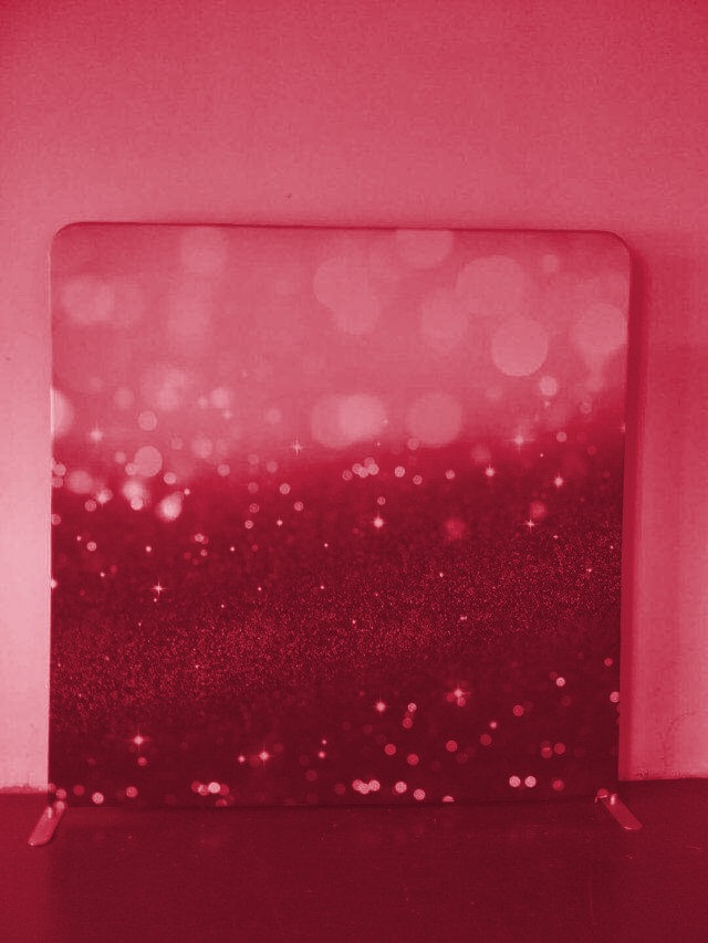 Red photo booth backdrop